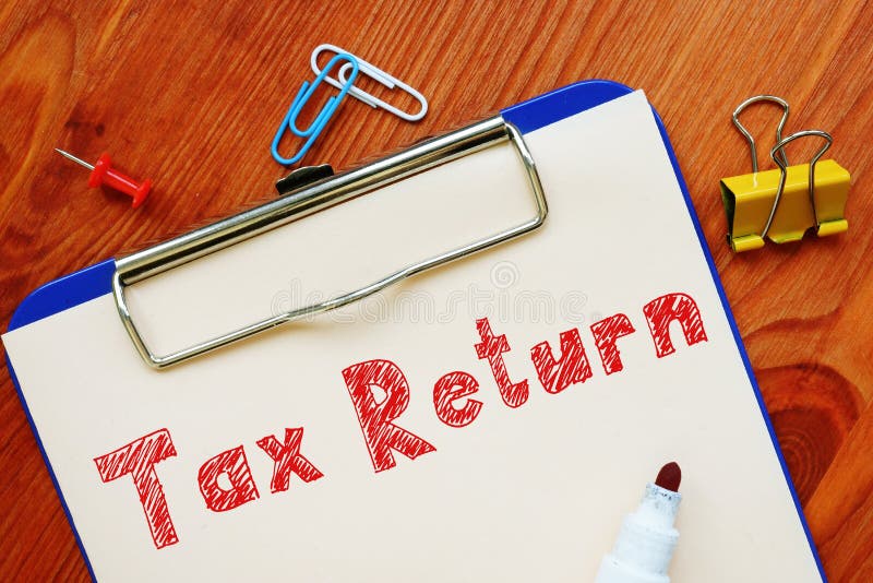 business-concept-meaning-tax-return-with-sign-on-the-page-stock-image