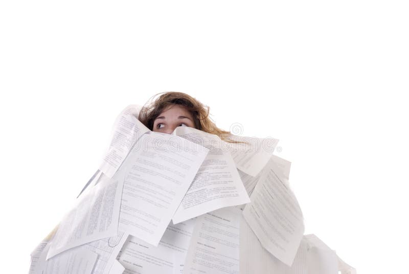 Business concept:young woman drowning in papers