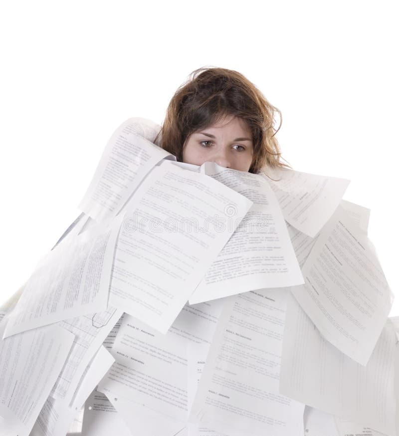 Business concept:young woman drowning in papers