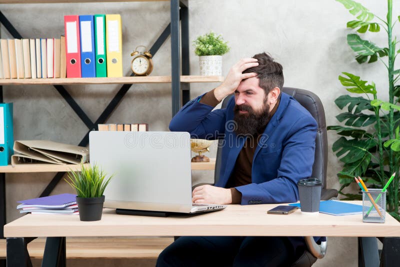 Business conflict. Oh no. Businessman in formal outfit. Confident man use laptop and smartphone. Boss workplace. Bearded stock photos Business conflict. Oh no. Businessman in formal outfit. Confident man use laptop and smartphone. Boss workplace. Bearded stock photos
