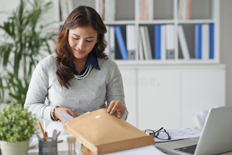 Business correspondence stock photo. Image of feminine 60090378