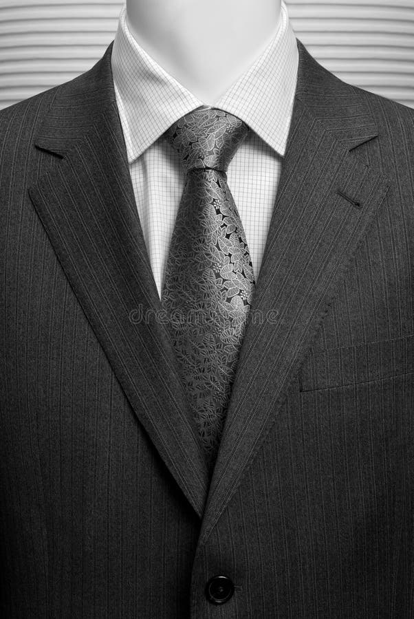 Business dark grey suite with white shirt and tie