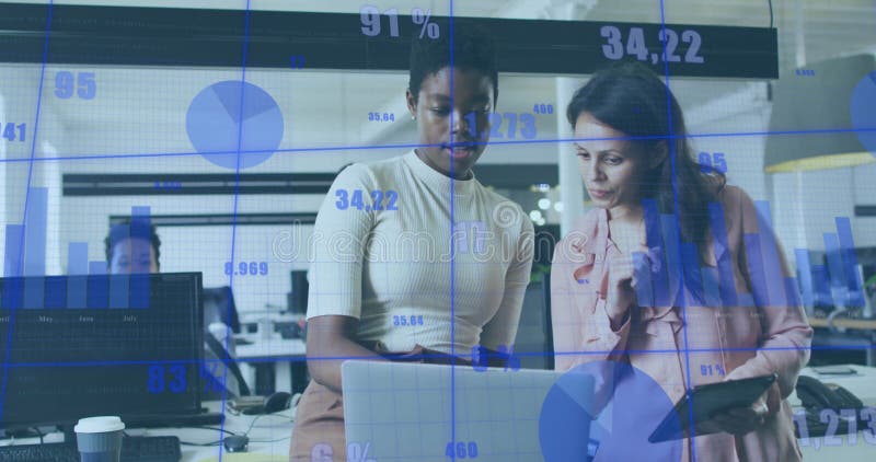 Business data charts image over two women discussing work in office stock photography