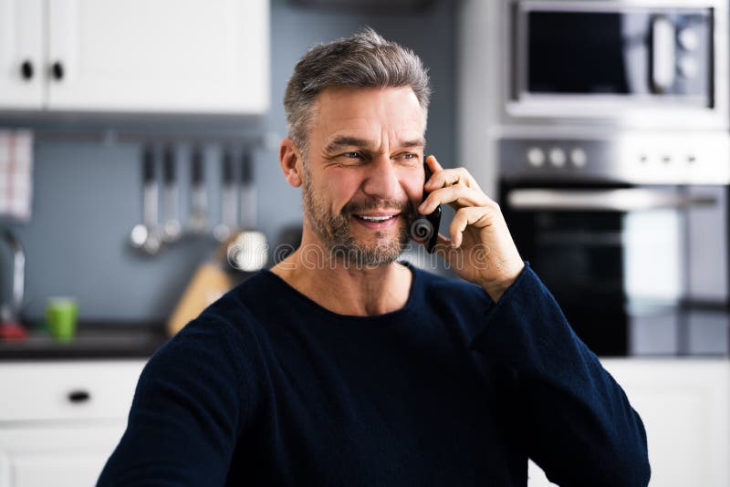 Business Desk Communication. Young Man Talking On Phone. Types conflict stock images, royalty-free photos and pictures