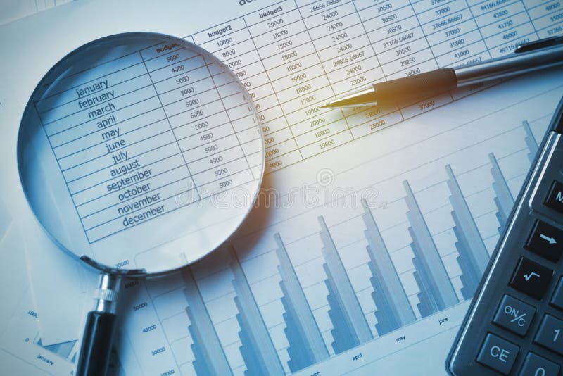 business documents accounting with calculator, pen and magnifying glass. concept for financial stock photography business documents accounting with calculator, pen and magnifying glass. concept for financial stock photography