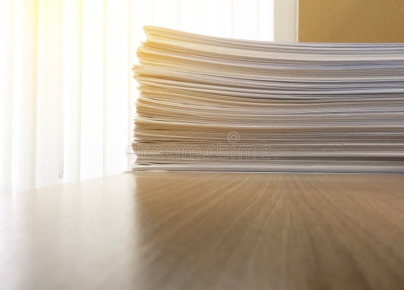 Business file documents paper stack on office wood table stock image Business file documents paper stack on office wood table stock image