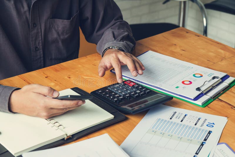Business and finance concept of office working, Businessman using smartphone and discussing investment business plan in office royalty free stock images Business and finance concept of office working, Businessman using smartphone and discussing investment business plan in office royalty free stock images