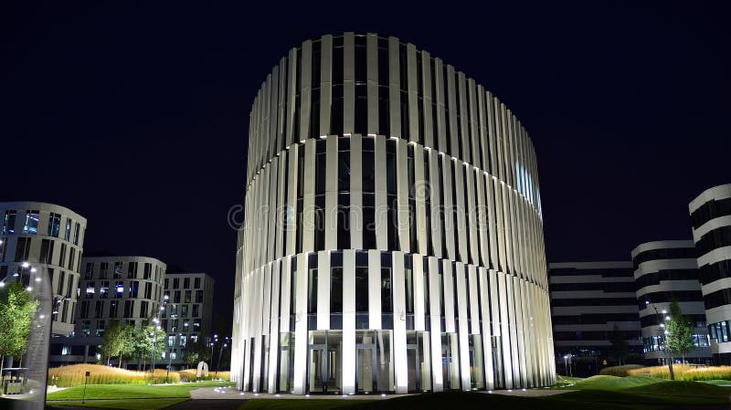 Warsaw, Poland.28 August 2019. Business Garden complex in night. Seven independent buildings characterized by original architecture and an internal green garden.