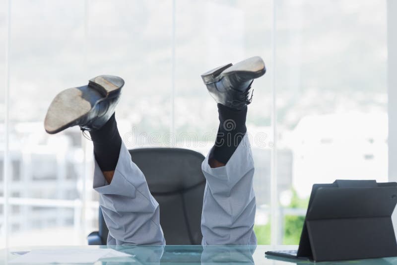 Business getting crazy falling from his swivel chair in bright office