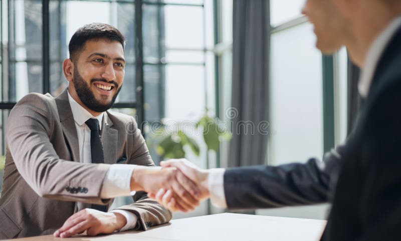 Closeup of handshake of business partners royalty free stock photography