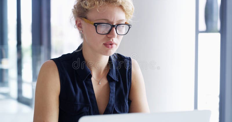 Business, laptop and woman in office, online reading and internet with editing, connection and network. Person, employee and journalist in workplace, computer or research for article, pc and deadline. Editing project stock images, royalty-free photos and pictures