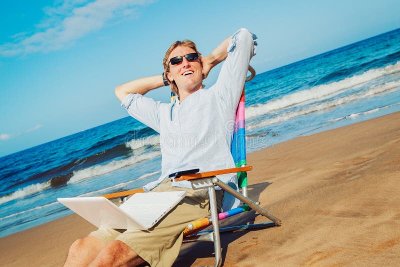 Business man on the beach stock photo. Image of communicator - 25672766