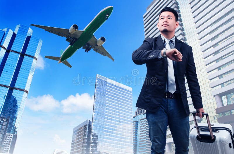 Business man and big belonging luggage watching to sky and hand