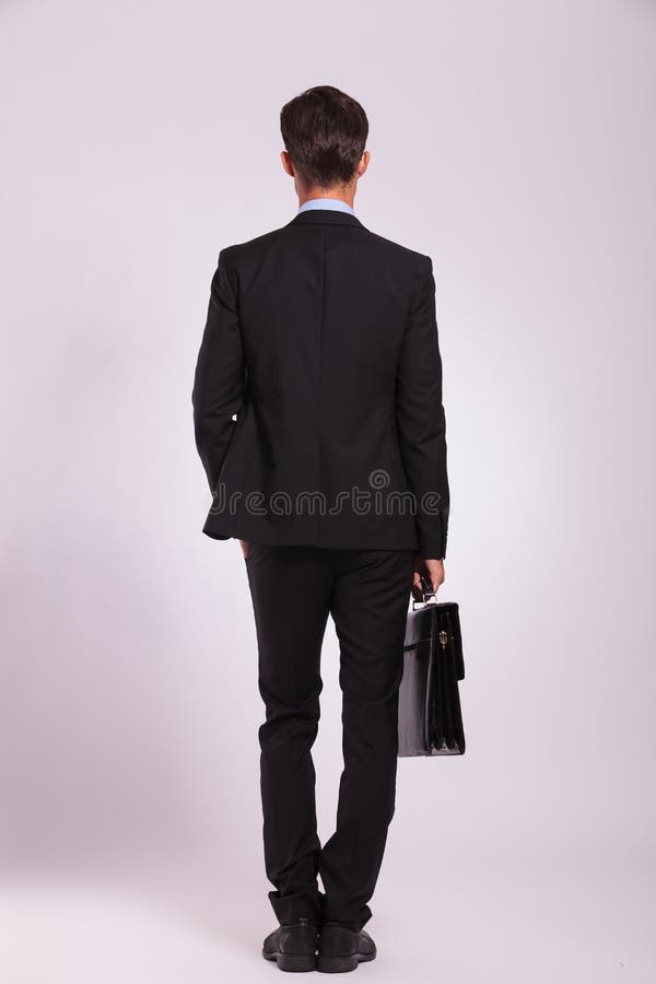 Business man & brief, back view royalty free stock photos