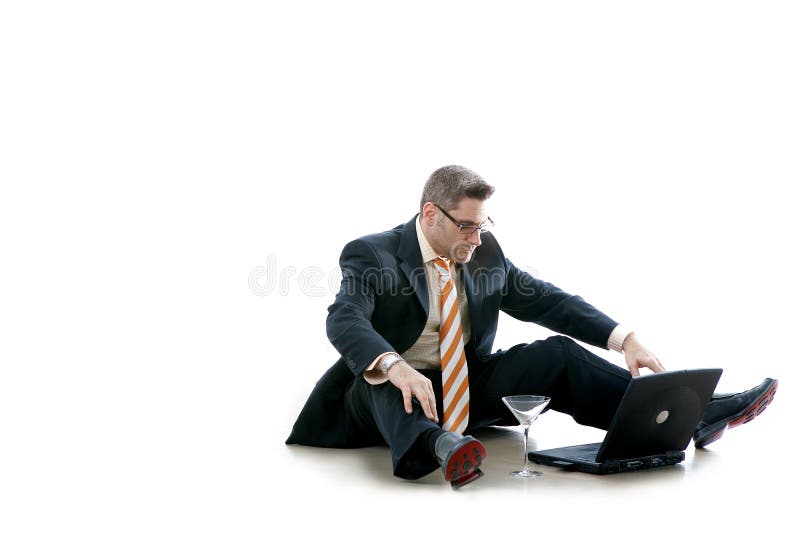 Business Man Checks His Email (Workaholic). Business man checks his email on wireless Laptop (notebook Business Man Checks His Email (Workaholic). Business man checks his email on wireless Laptop (notebook