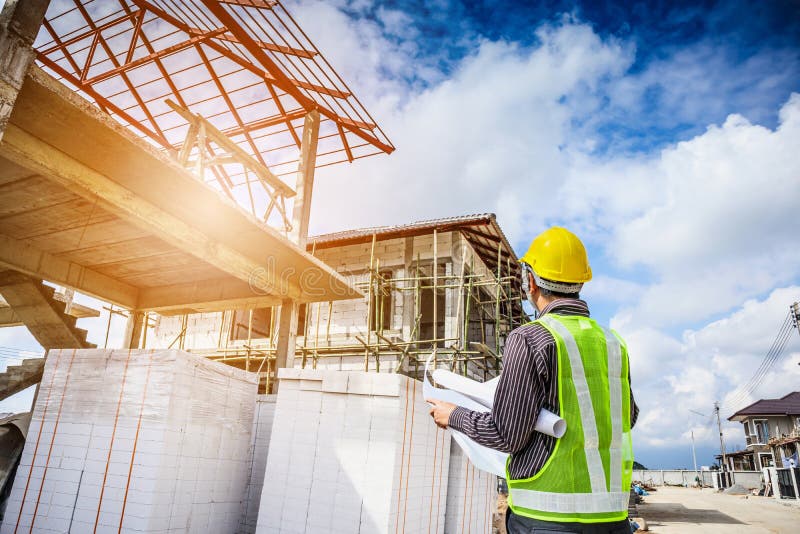 Business man construction engineer worker at house building site