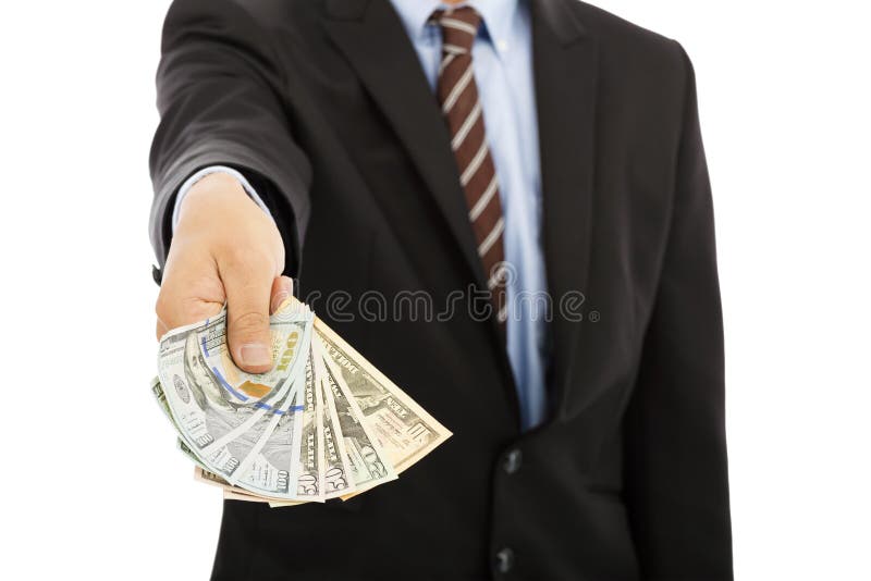 Business man displaying a spread of us dollar cash