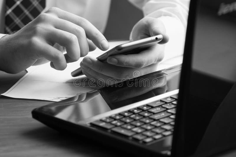 Business Man Drinking Coffee  And Using Laptop Computer  