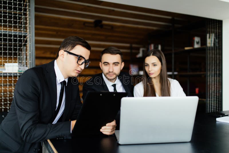 Business man explain documents details for team in office. royalty free stock images Business man explain documents details for team in office. royalty free stock images