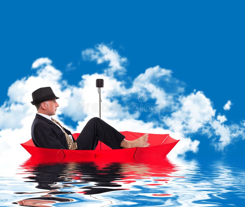 Business man floating on umbrella stock images Business man floating on umbrella stock images