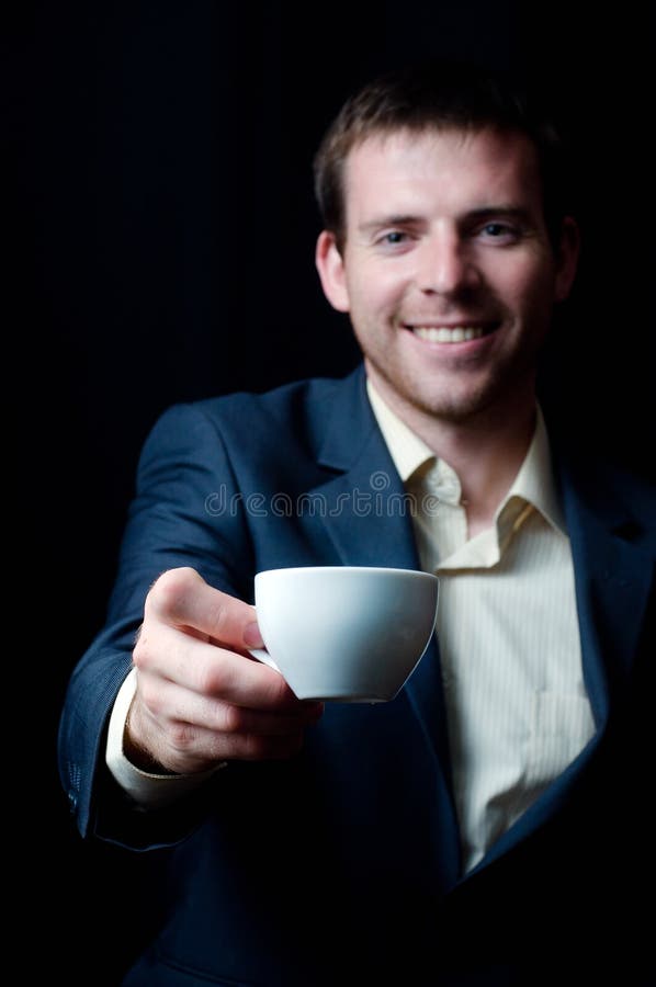Business Man Giving You a Coffee Cup Stock Photo Image of lowkey