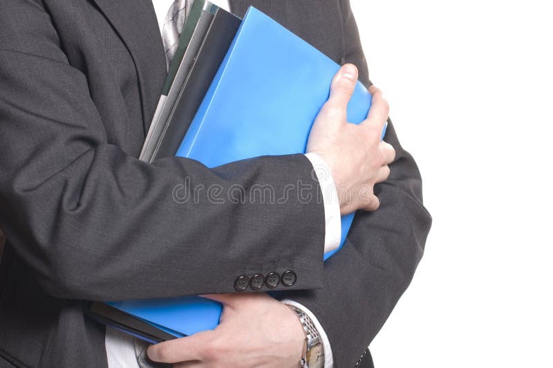 Business man holding stack of files and folders. Business man holding stack of files and folders