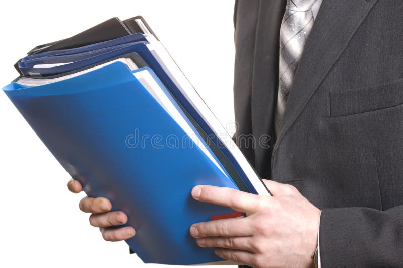 Business man holding stack of files and folders. Business man holding stack of files and folders