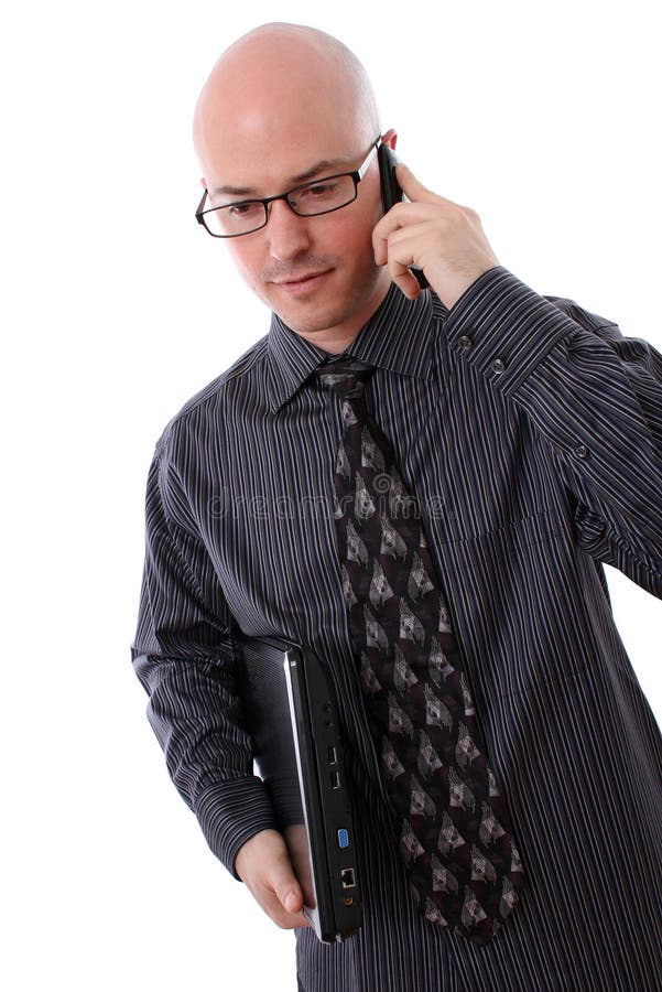 Business Man Holding Mobile Phone and Laptop