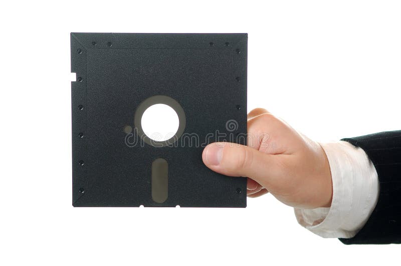 Business man holding old floppy