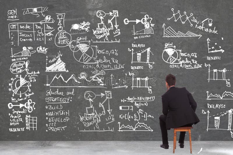 Back of a seated pensive business man looking at some calculations on a big wall. Diagram marketing research concept stock images, royalty-free photos and pictures