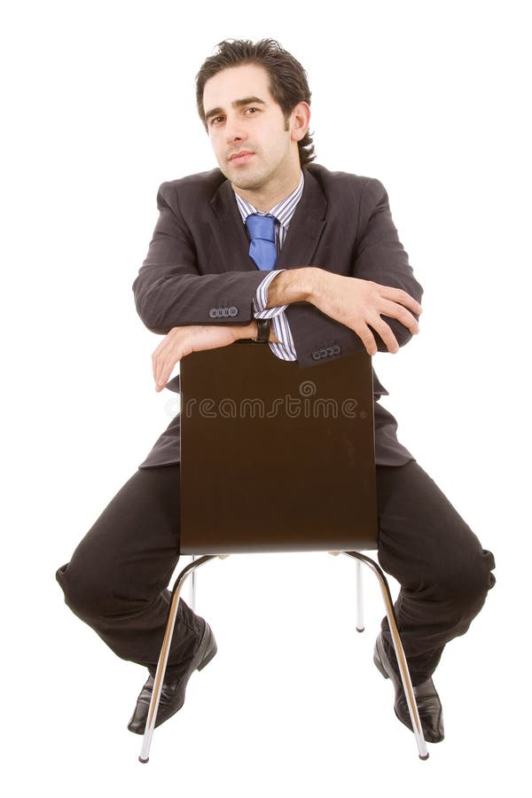 Business man portrait sitting on a chair