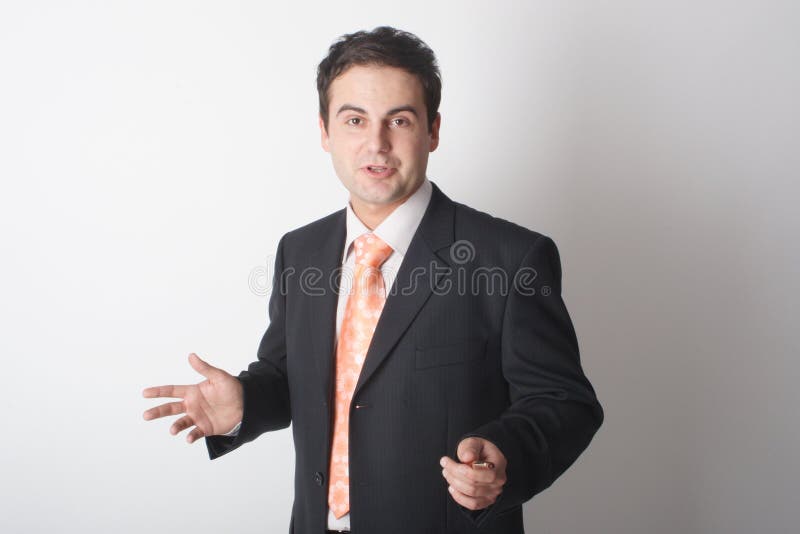 Business man in suit during presentation - close up. Business man in suit during presentation - close up