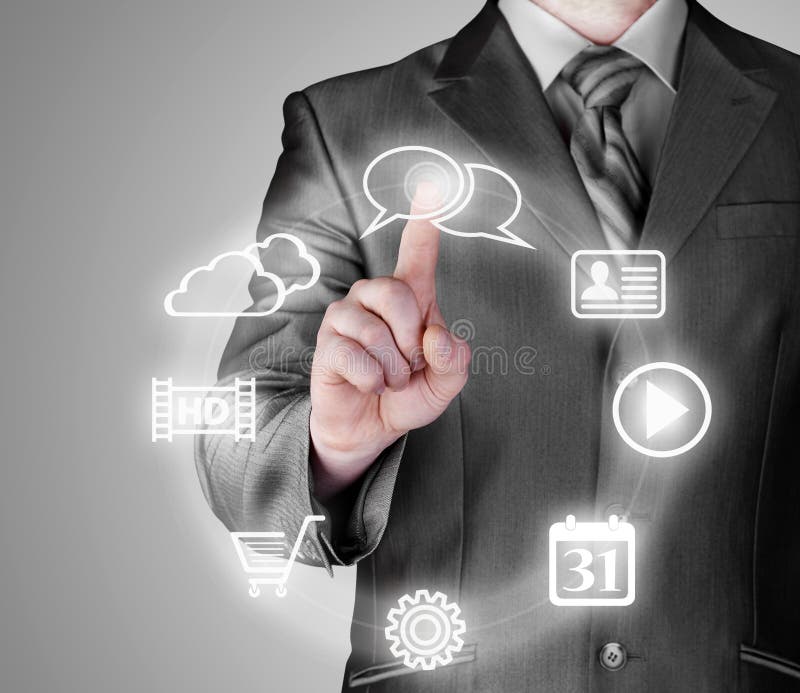 Business man pressing an icon in air royalty free stock photos