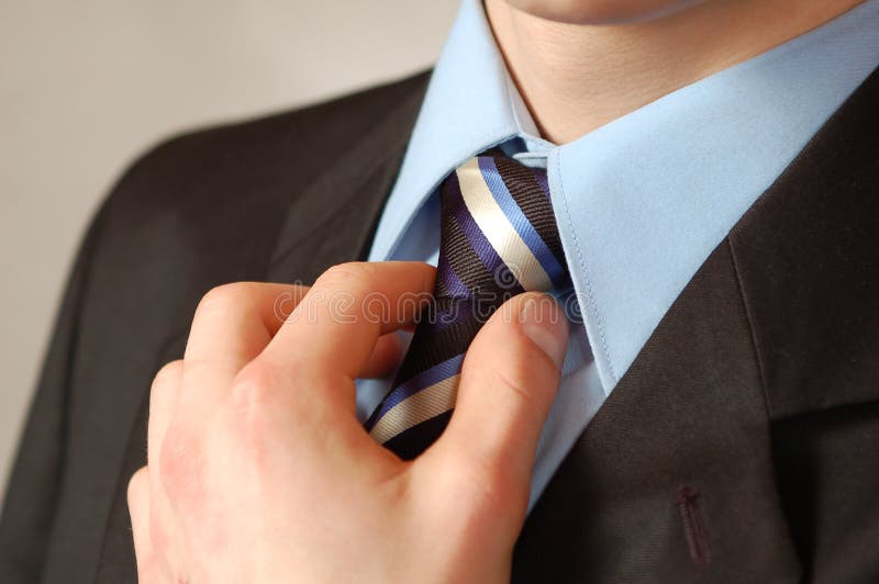 Business man s tie and hand