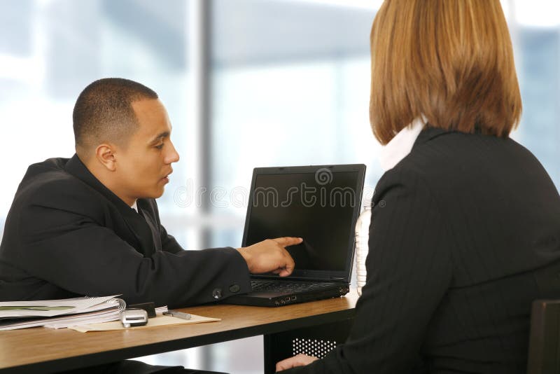 Business Man Showing Laptop To His Partner