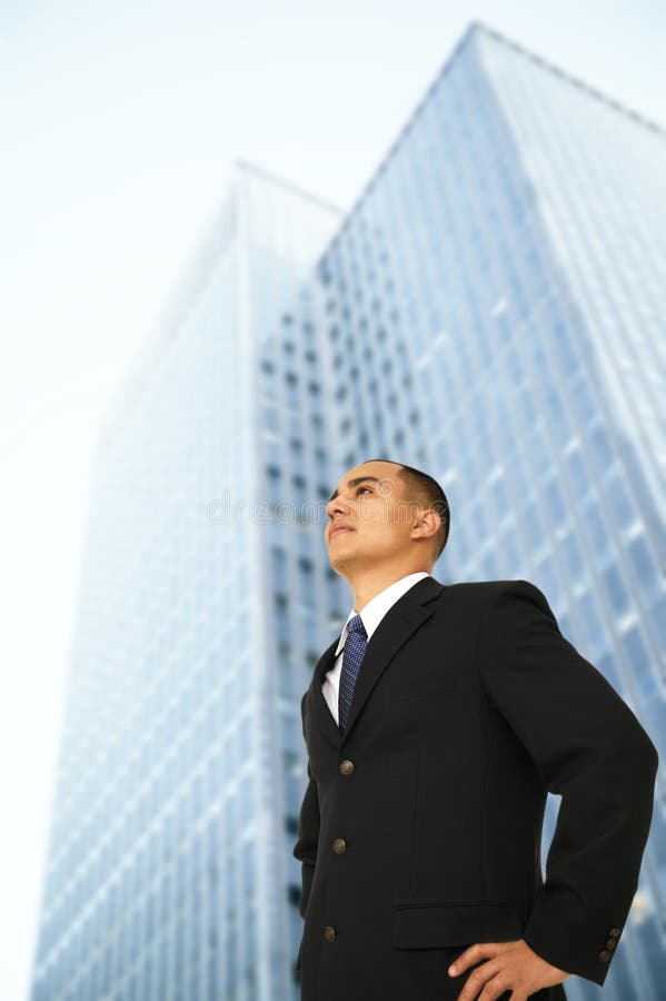 Business Man Standing By His Office Building