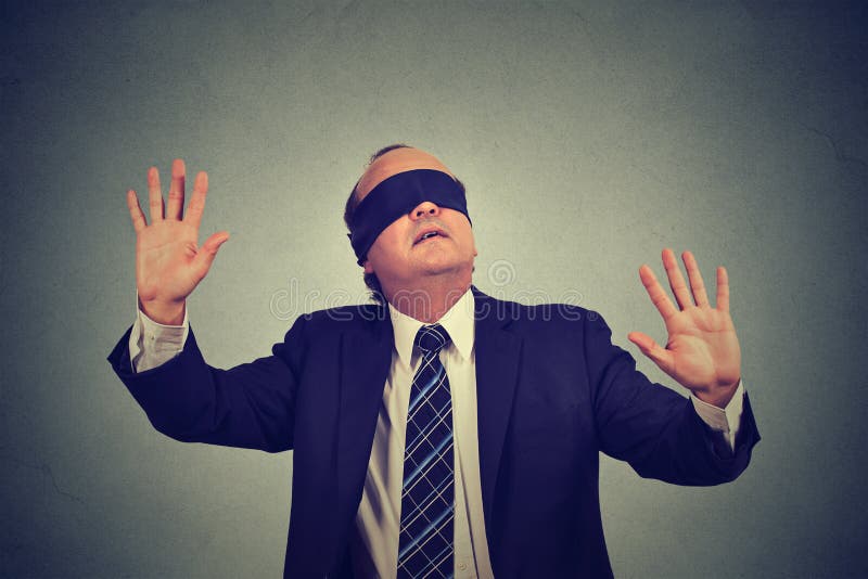 Portrait Blindfolded Man Stretching His Arms Out Walking Through Many  Question Marks Isolated On Gray Wall Background Stock Photo, Picture and  Royalty Free Image. Image 64446917.