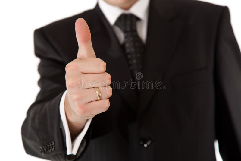 Business man in suit thumbs up