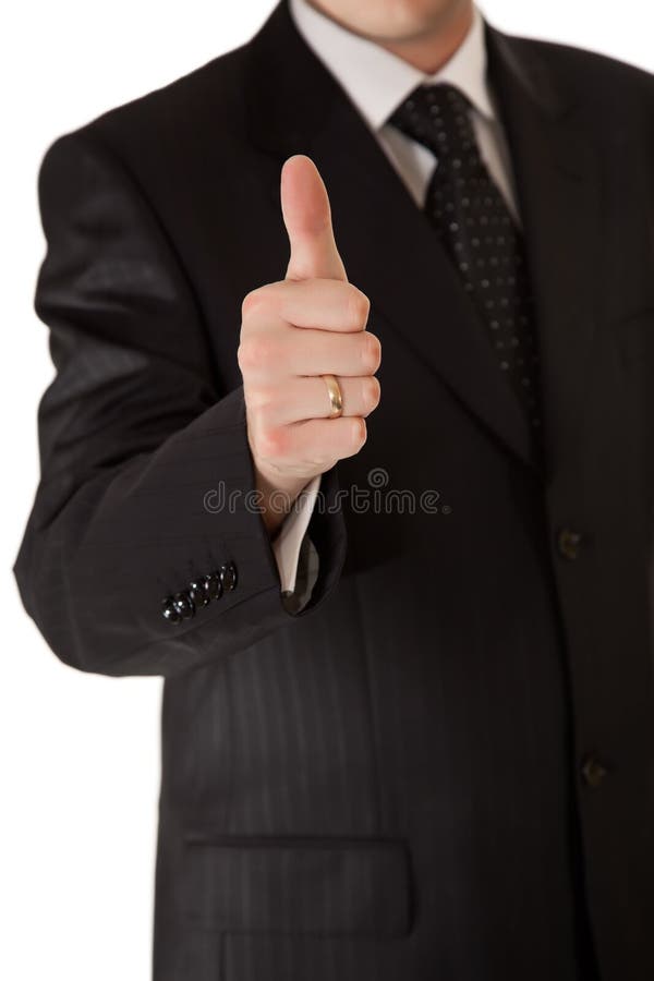 Business man in suit thumbs up