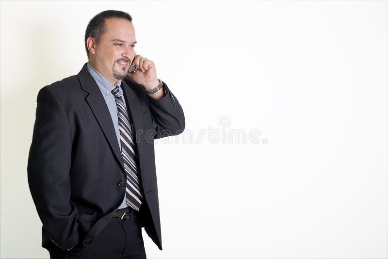 Business Man Talking On A Cell Phone