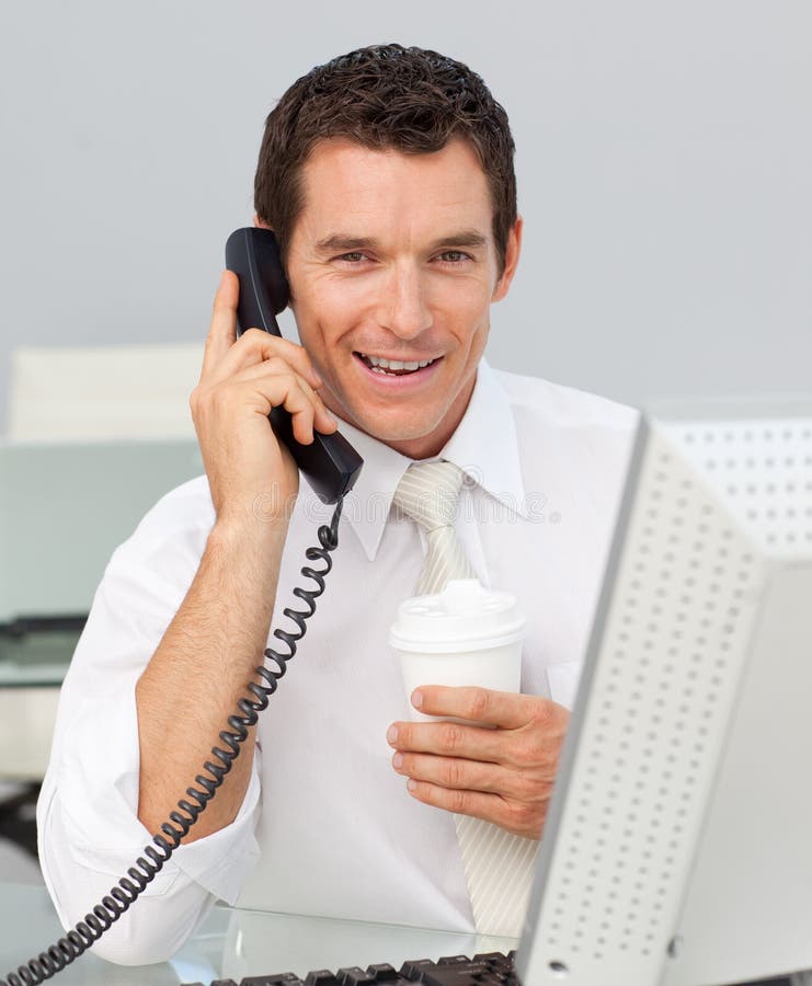Business Man Talking On Phone In The Office Stock Image