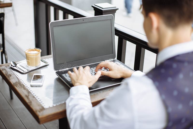 Business man using laptop in coffee shop. royalty free stock images Business man using laptop in coffee shop. royalty free stock images