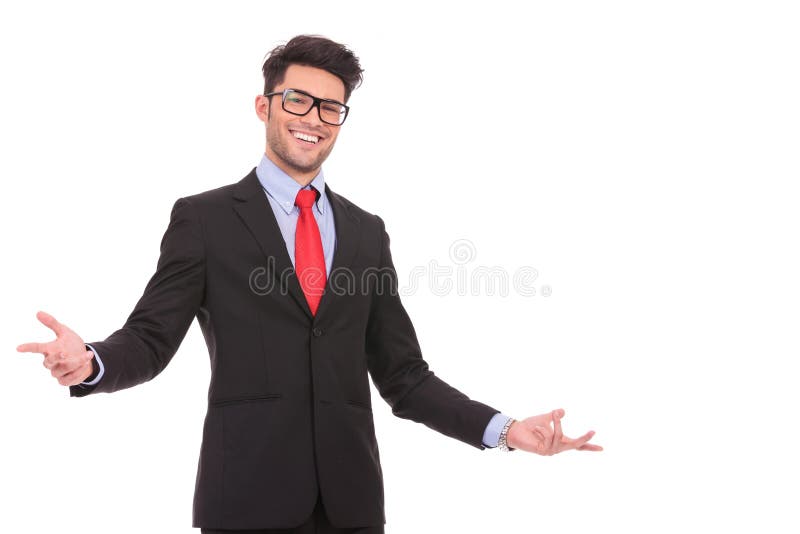 Young business man wellcoming you with a big smile on his face, isolated on white. Young business man wellcoming you with a big smile on his face, isolated on white