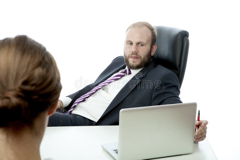 Beard business men brunette women at desk ignoring. Beard business men brunette women at desk ignoring