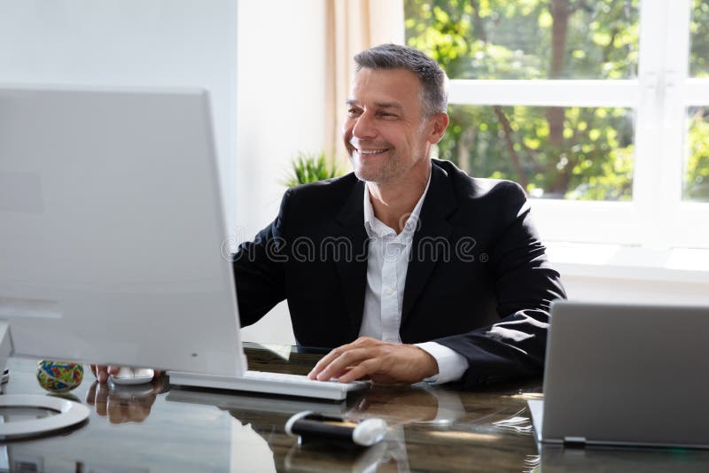 Business Man Working On Computer