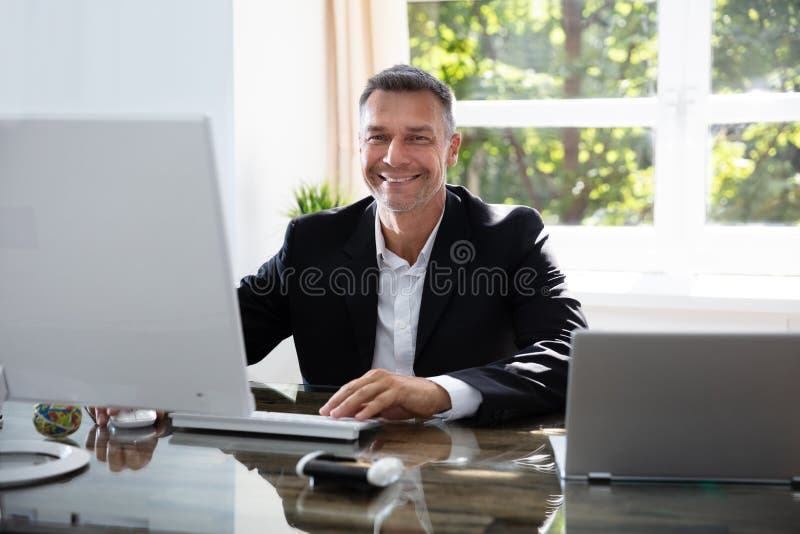 Business Man Working On Computer