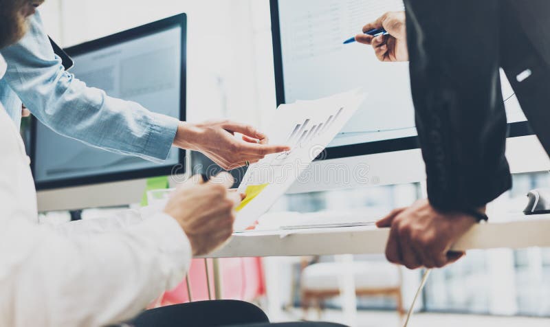 Business meeting brainstorming, documents holding hands. Photo account managers crew working with new startup project stock photos Business meeting brainstorming, documents holding hands. Photo account managers crew working with new startup project stock photos