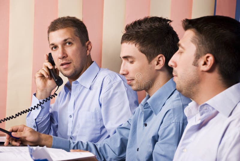 Business men partners in office working royalty free stock photo Business men partners in office working royalty free stock photo