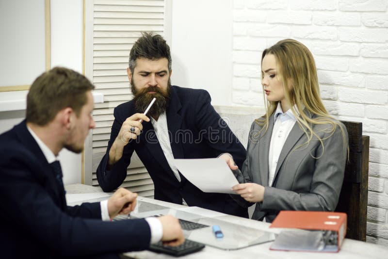 Business negotiations, discuss working tasks. Lady manager tries to organize working process with colleagues in office stock images Business negotiations, discuss working tasks. Lady manager tries to organize working process with colleagues in office stock images