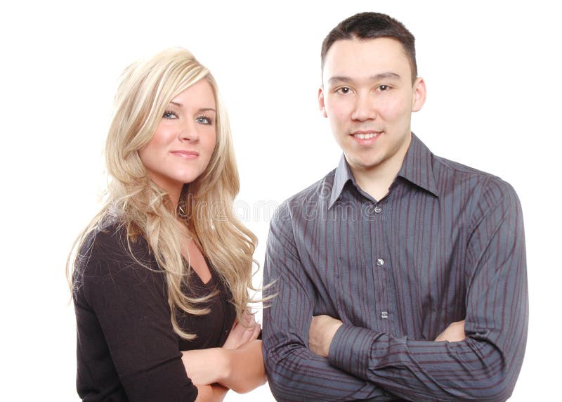 Business partners or couple are posing against white background